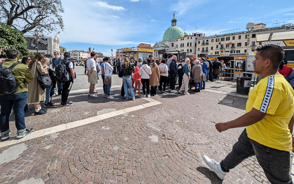 Crowd at Ferrovia waterbus stop, Venice.