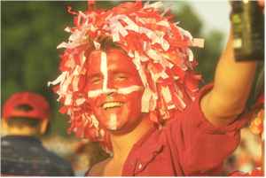 Photo - man with Danish Flag face paint